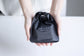 Waterproof pouch for a wet bar of soap